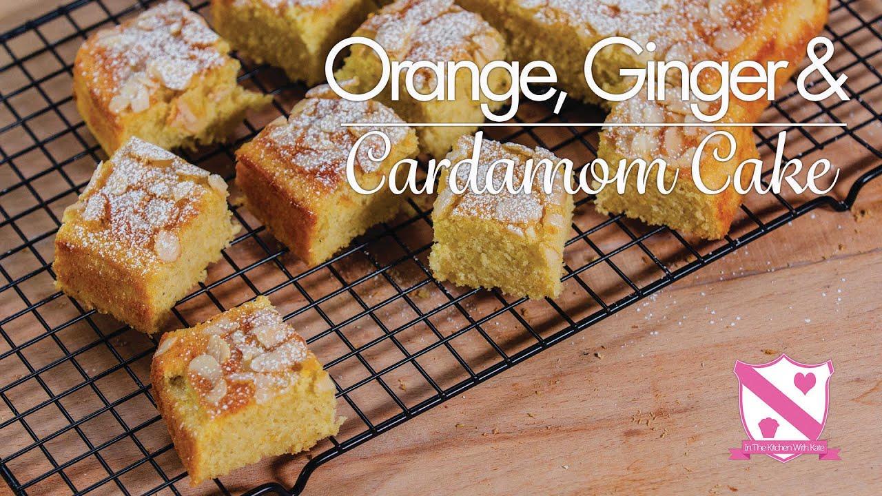 A person joyfully baking the orange and ginger cake in the kitchen