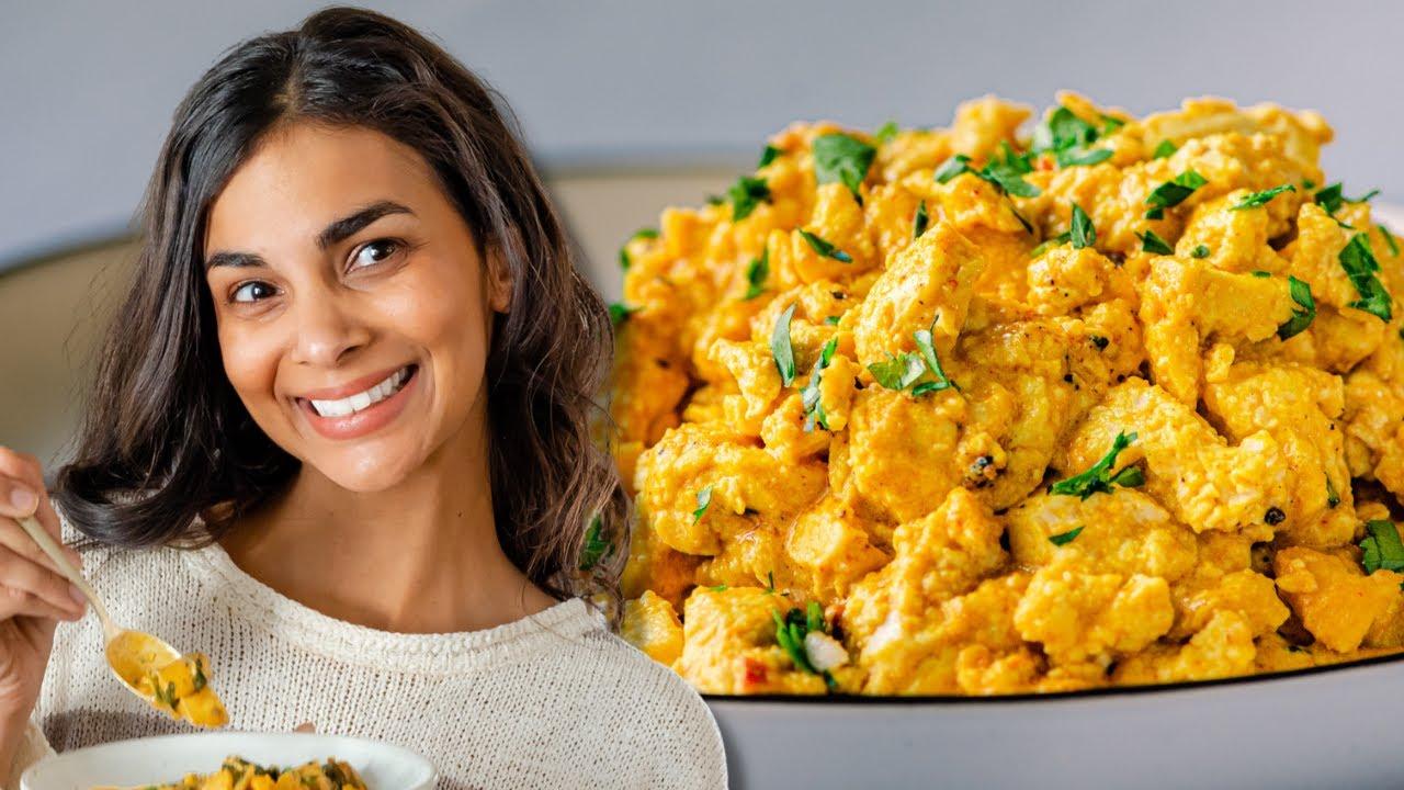 Person happily eating a bowl of tofu scramble
