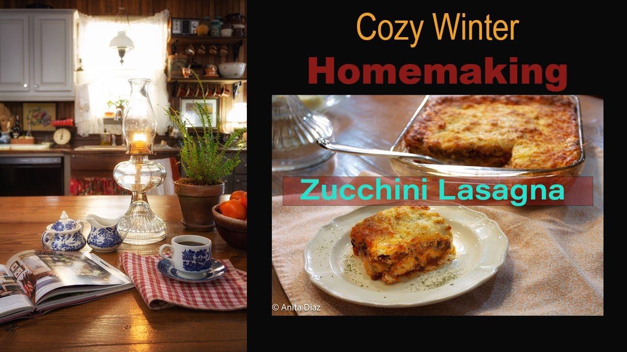 A rustic-looking kitchen scene with a zucchini lasagna on the counter.