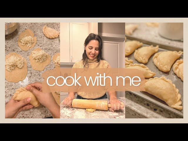 Woman making empanada dough