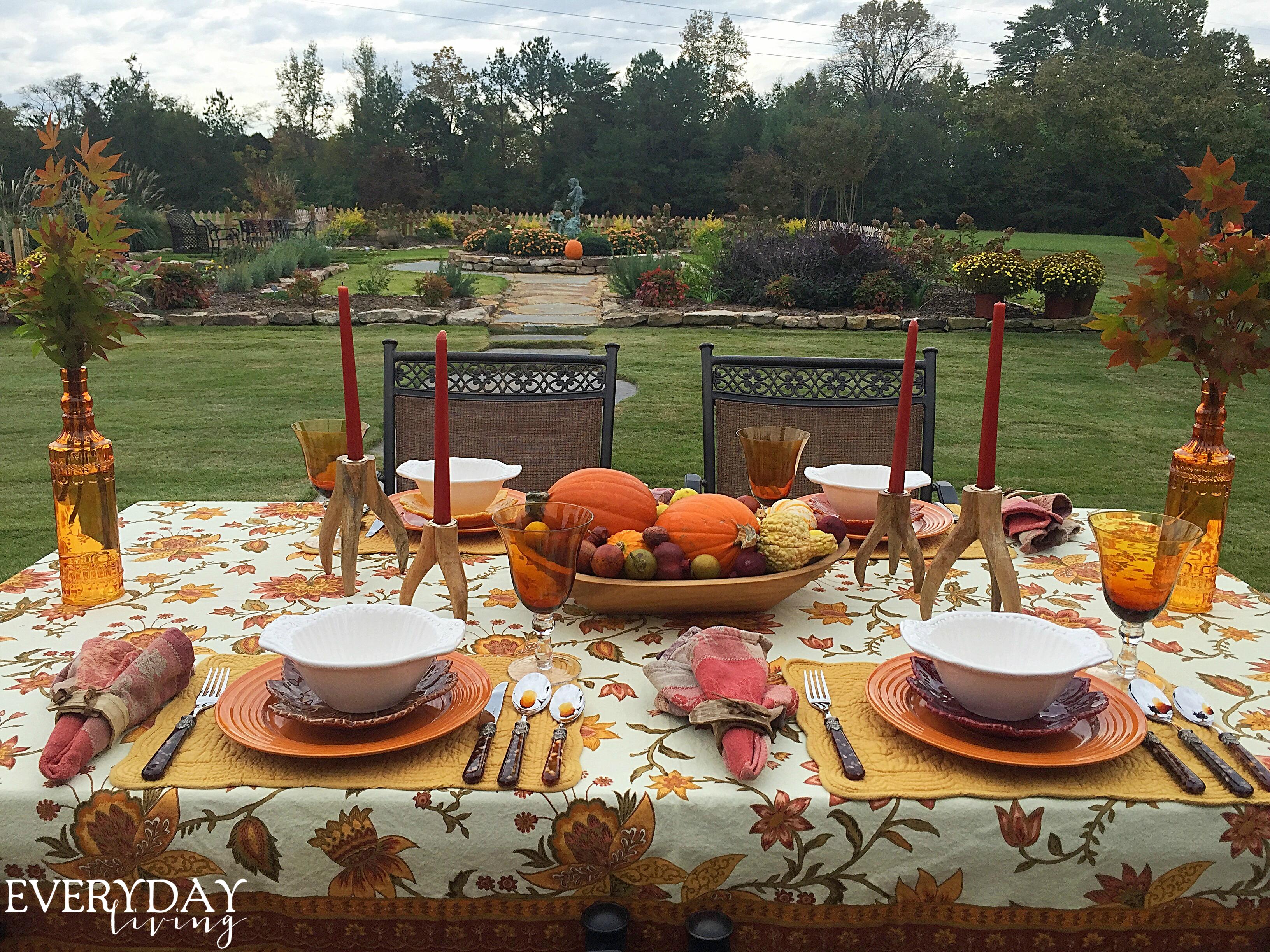 A rustic, cozy scene of a family gathering around a table, enjoying bowls of butternut squash chili.