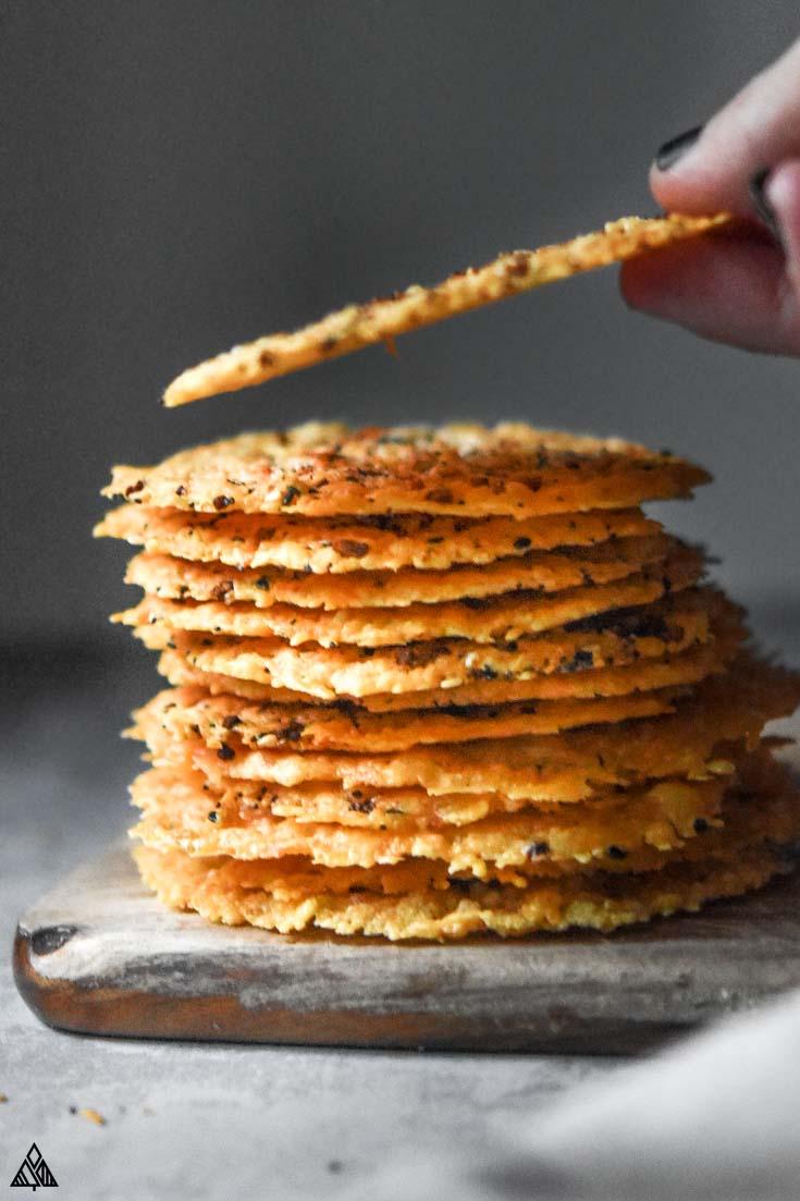 Crispy coconut flour parmesan crisps on a baking sheet