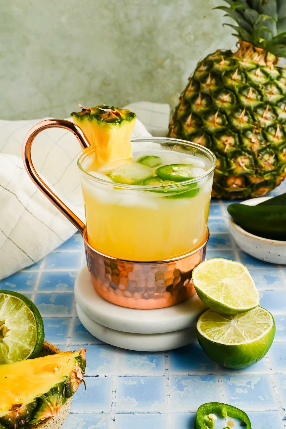 Moscow Mule variations with pineapple and ginger garnishes