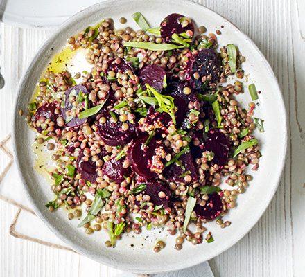 freshly prepared lentil and beetroot salad in a rustic bowl