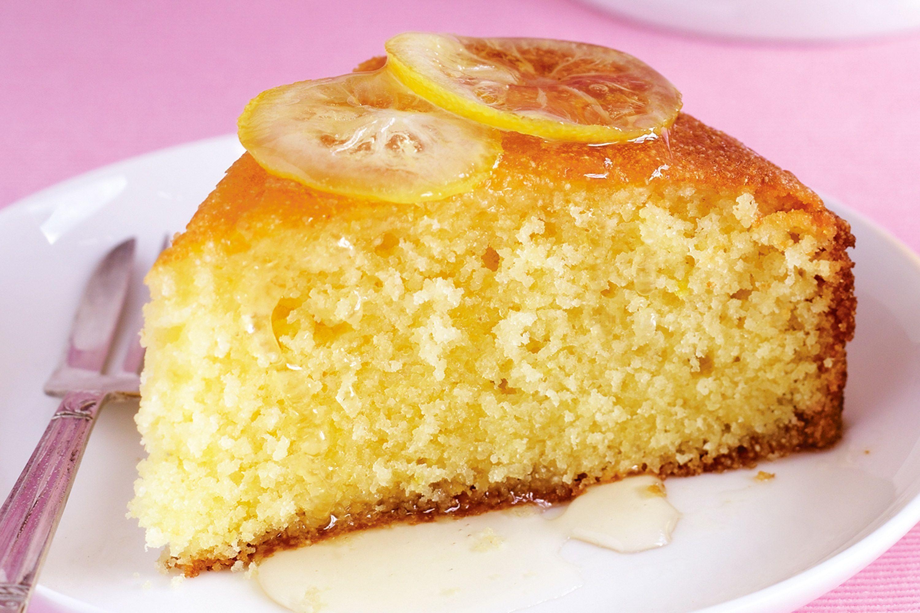 Close up of a slice of lemon semolina cake on a plate