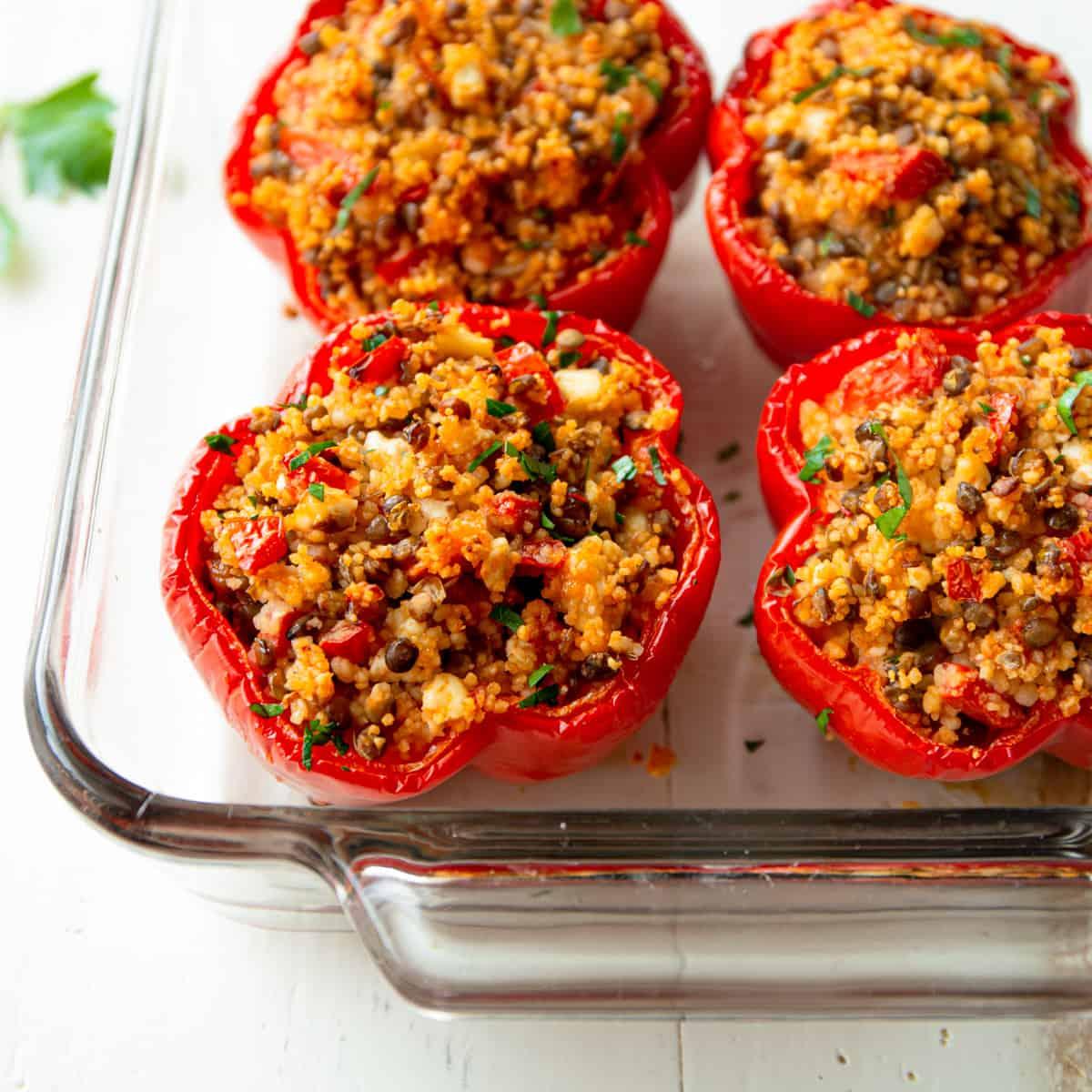 Israeli couscous stuffed peppers with harissa paste