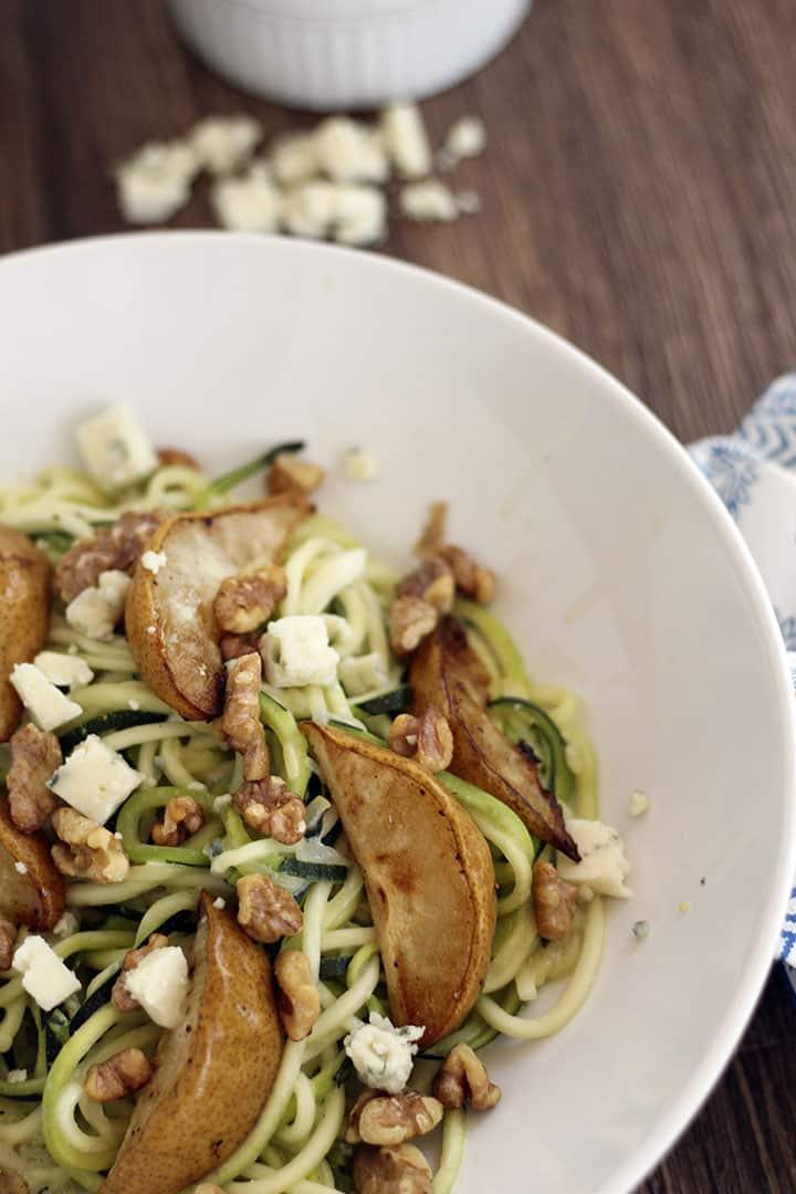 Close up shot of the zoodles with pears, gorgonzola, and walnuts