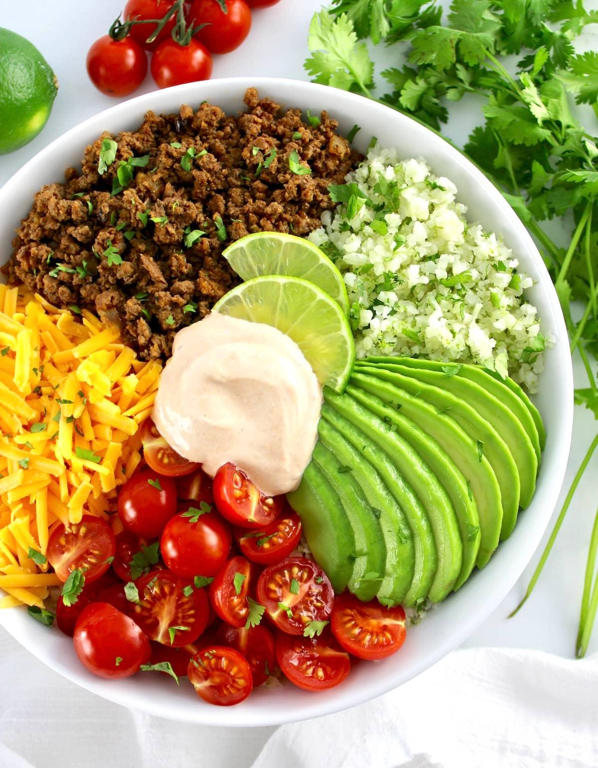 a vibrant bowl of keto-friendly rice and avocado salad