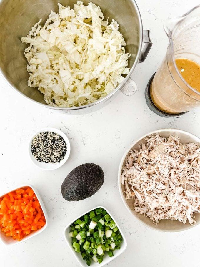 Overhead shot of all the ingredients needed for Keto Asian Avocado Salad