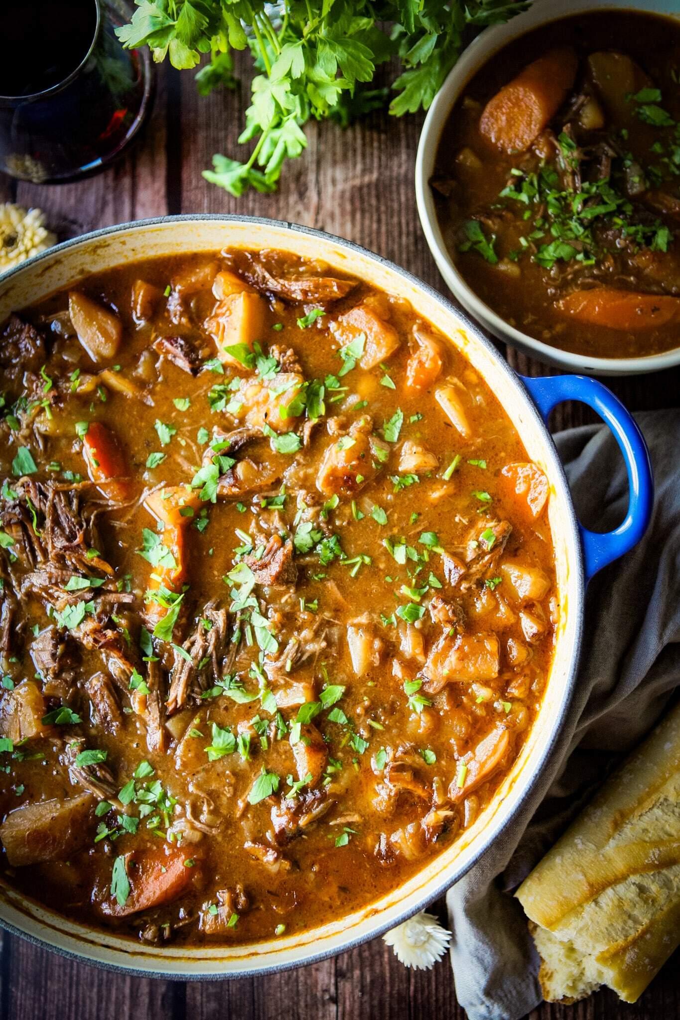 Close-up shot of a simmering Instant Pot Beef Stew with Red Wine, steam gently rising