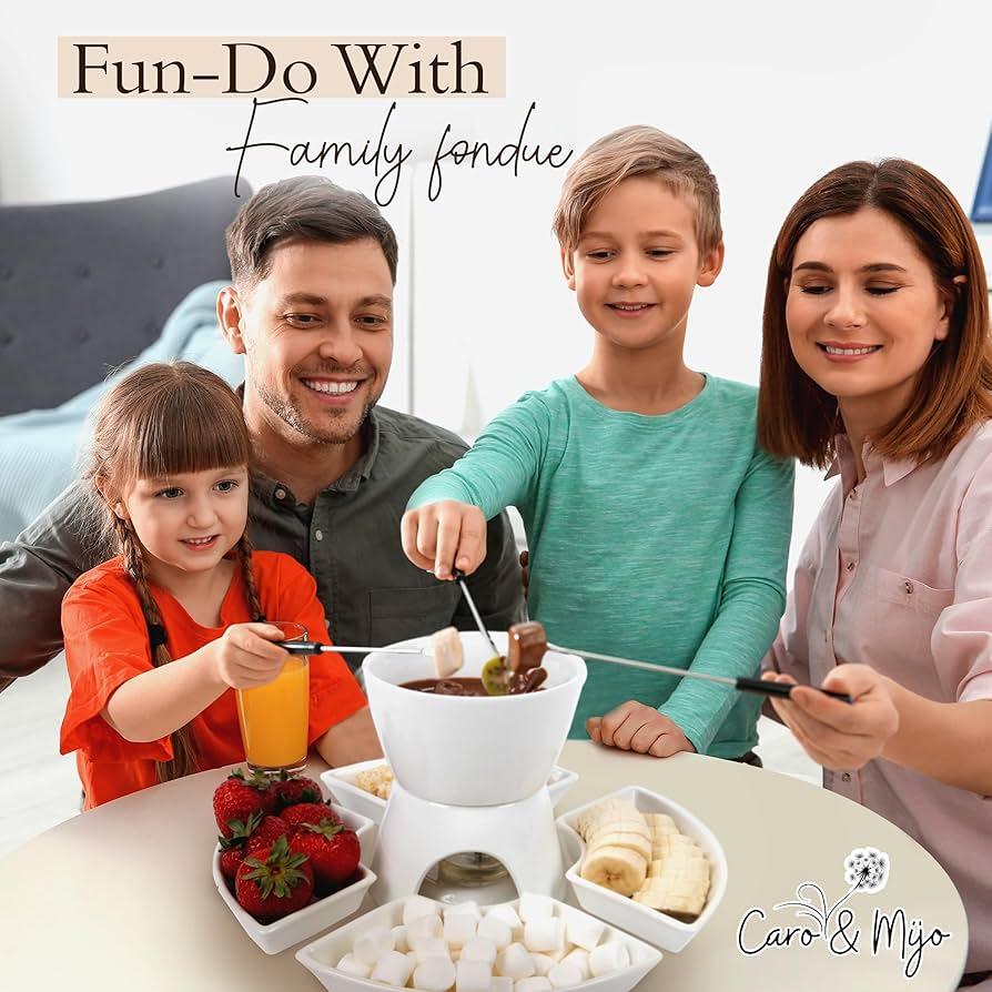 Happy family and friends gathered around a table, enjoying chocolate fondue