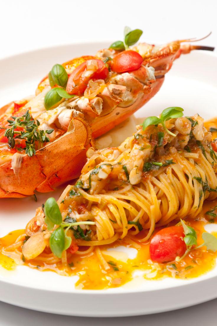Close up shot of a beautifully plated lobster pasta dish
