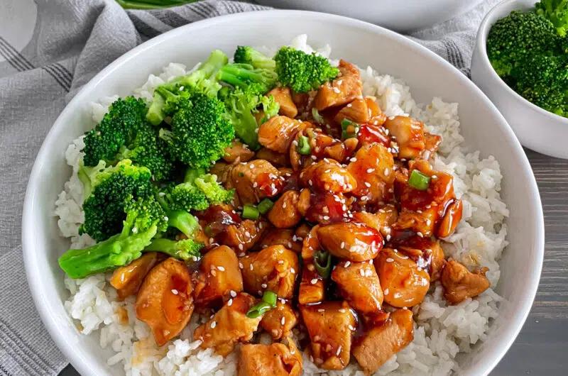 Close-up shot of a delicious chicken stir-fry protein bowl with rice
