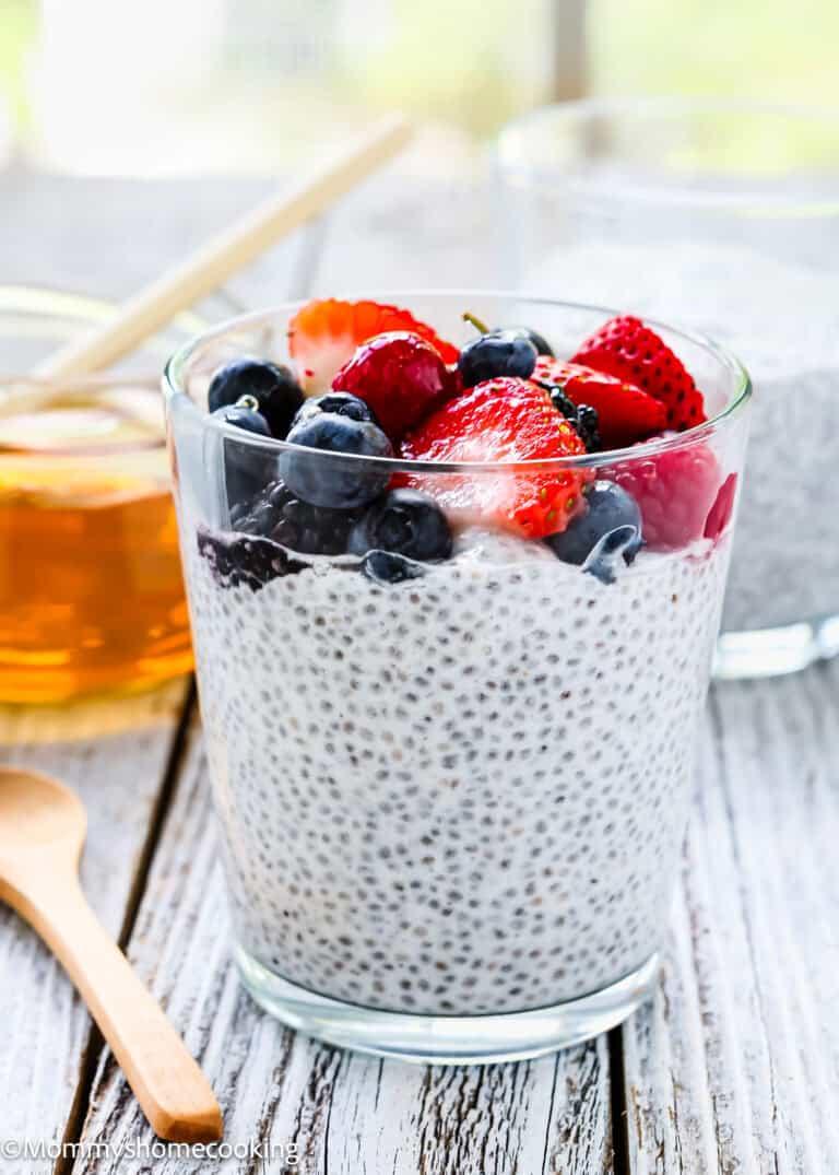 person smiling while preparing coconut chia seed pudding