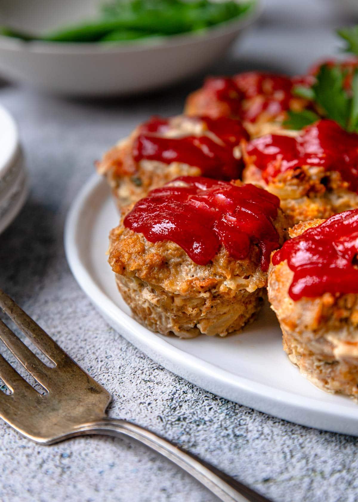 Close-up shot of delicious turkey meatloaf muffins in a muffin tin