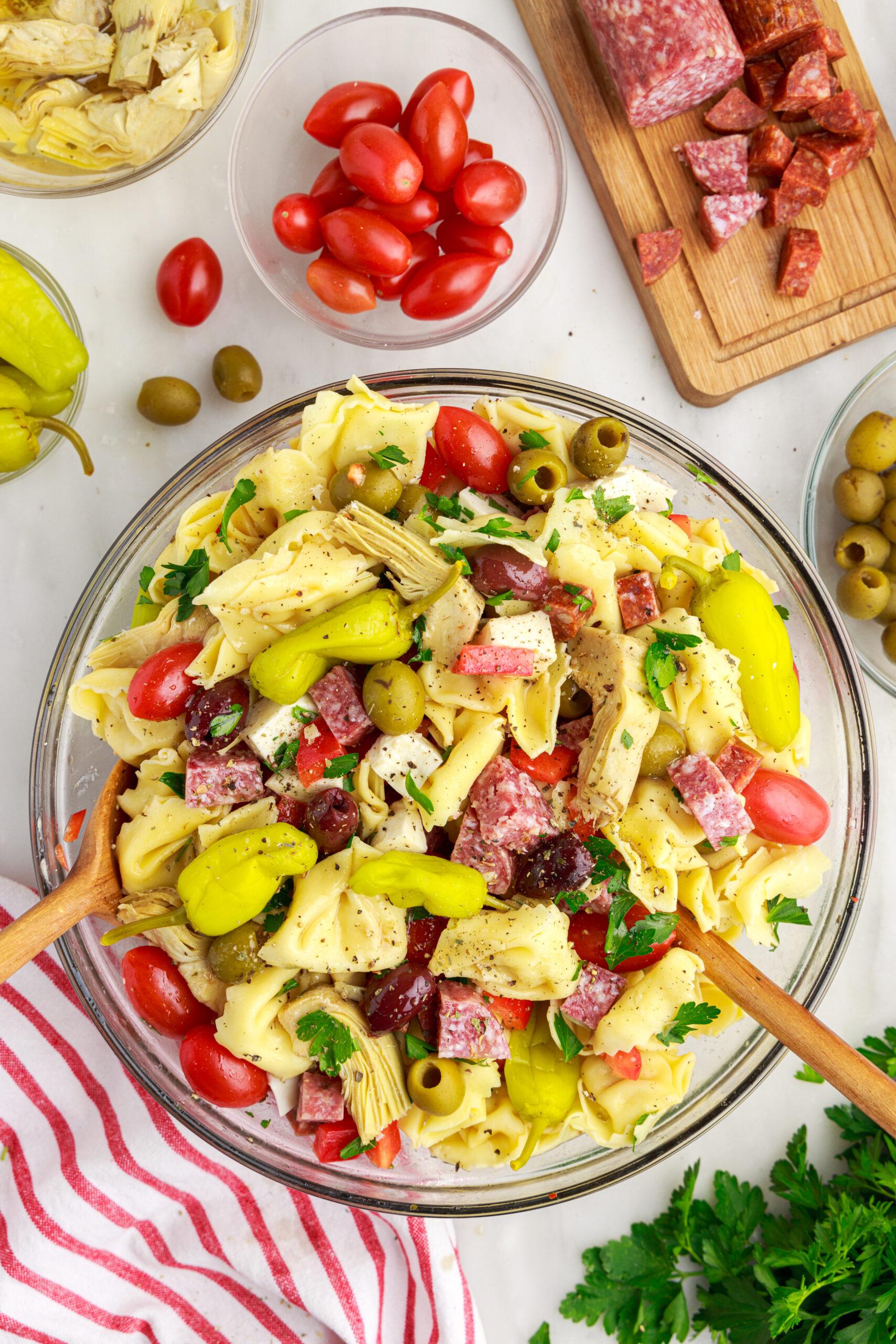 Family enjoying Antipasto Pasta Salad at a picnic table