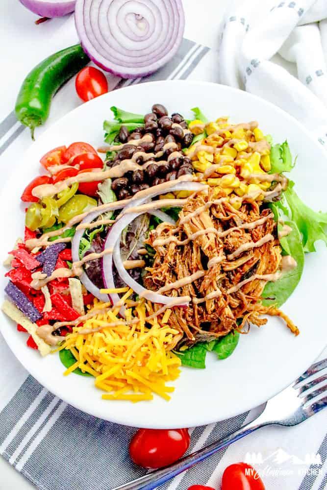Overhead shot of a vibrant slow cooker pulled pork salad