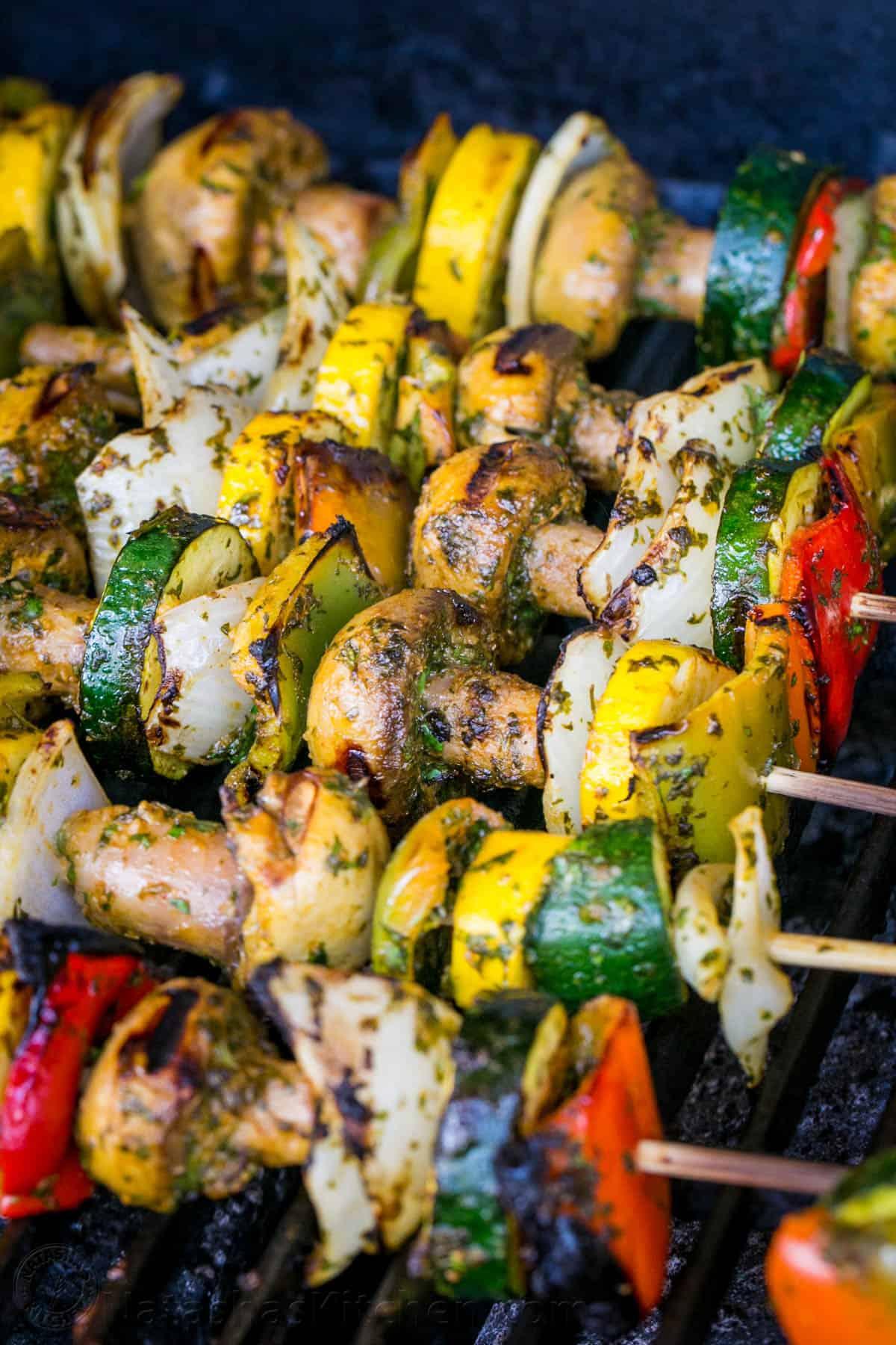 Close up of grilled vegetables on skewers