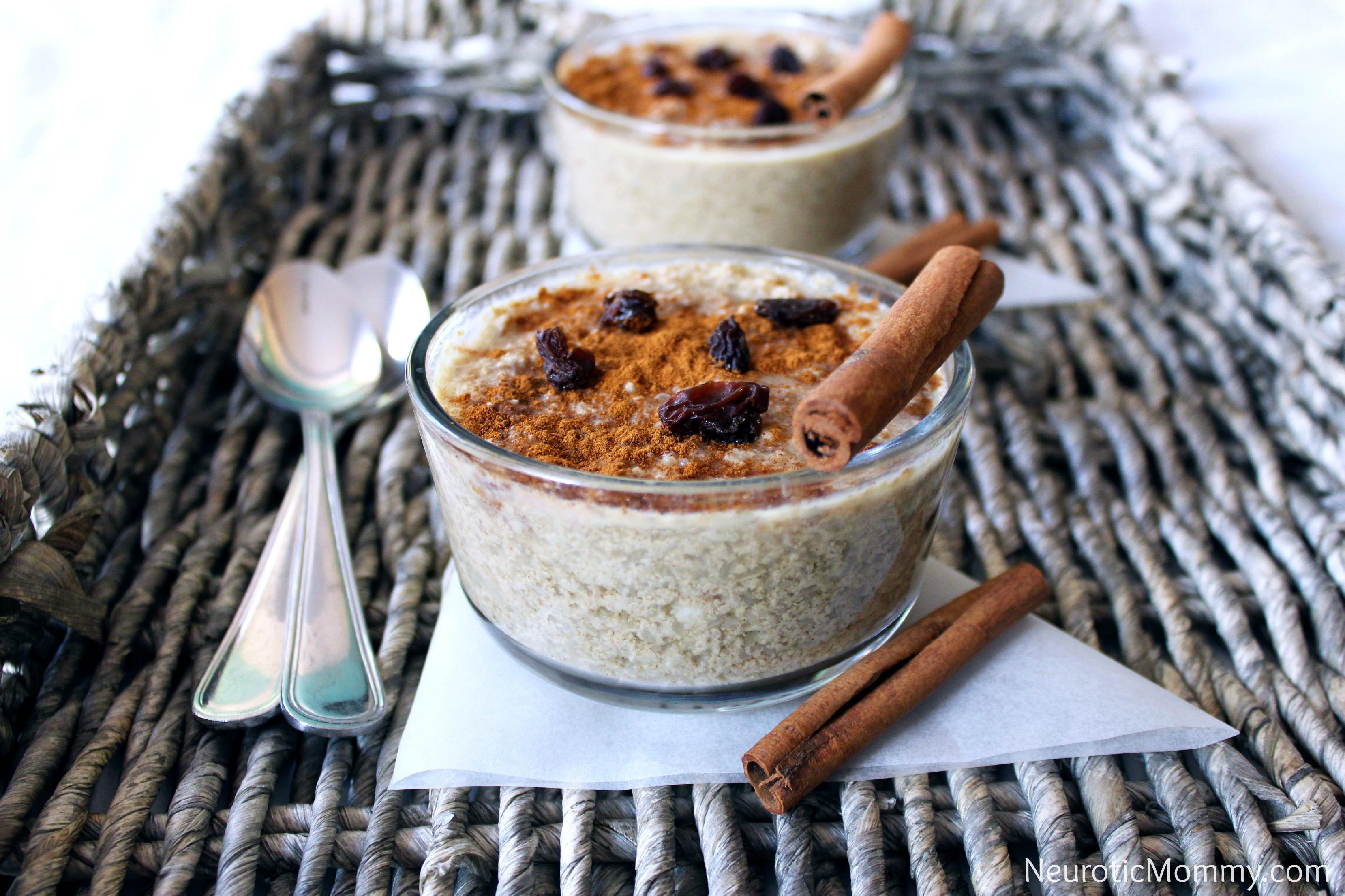 Close-up shot of a bowl of cauliflower rice pudding with cinnamon topping