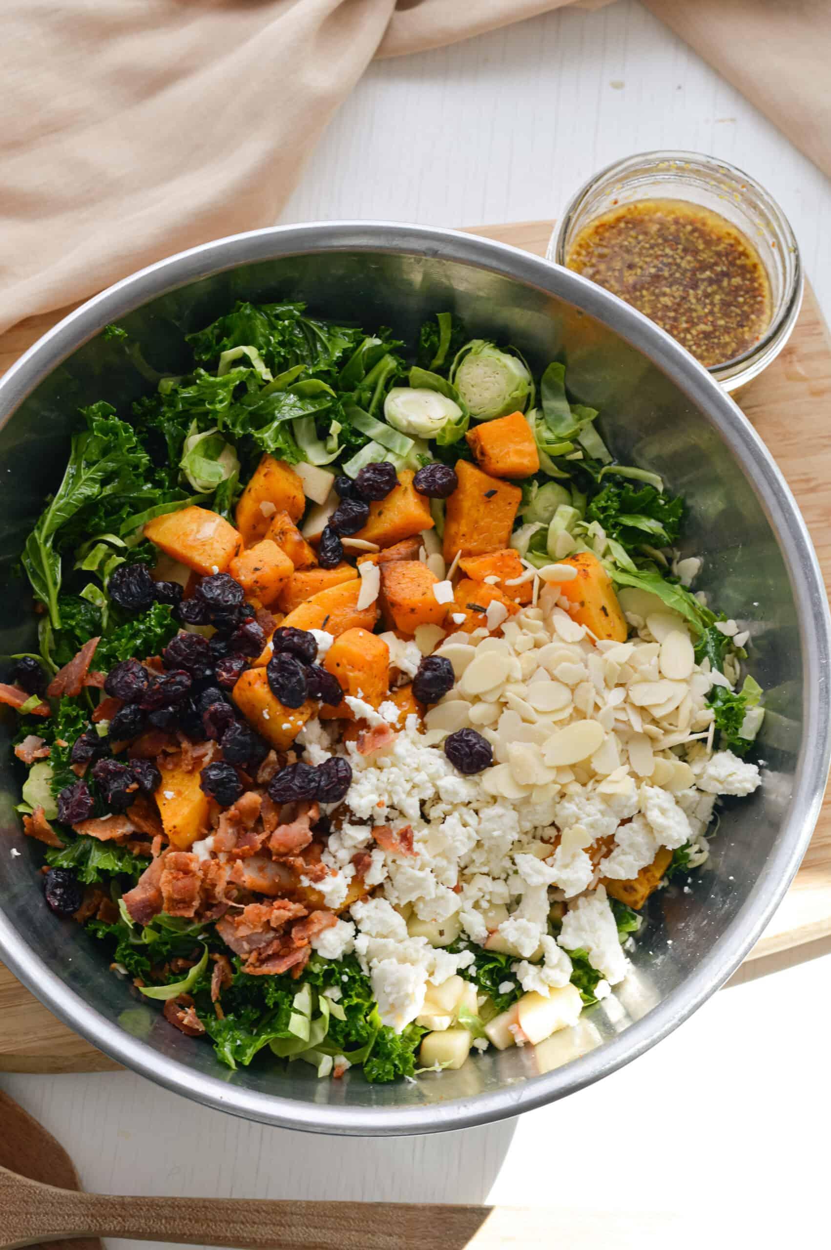 Close-up shot of a wheat berry and kale salad with maple-dijon dressing