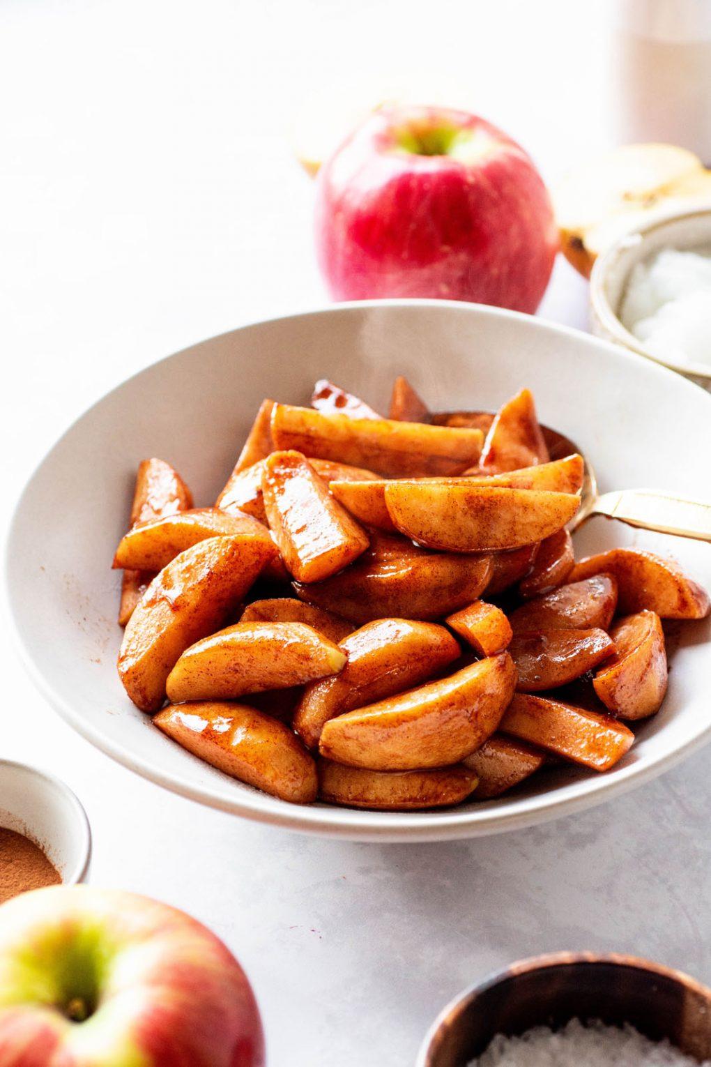Close-up shot of a single serving of the Paleo Fruit & Cinnamon Bowl, highlighting the texture and color of the apples and cinnamon