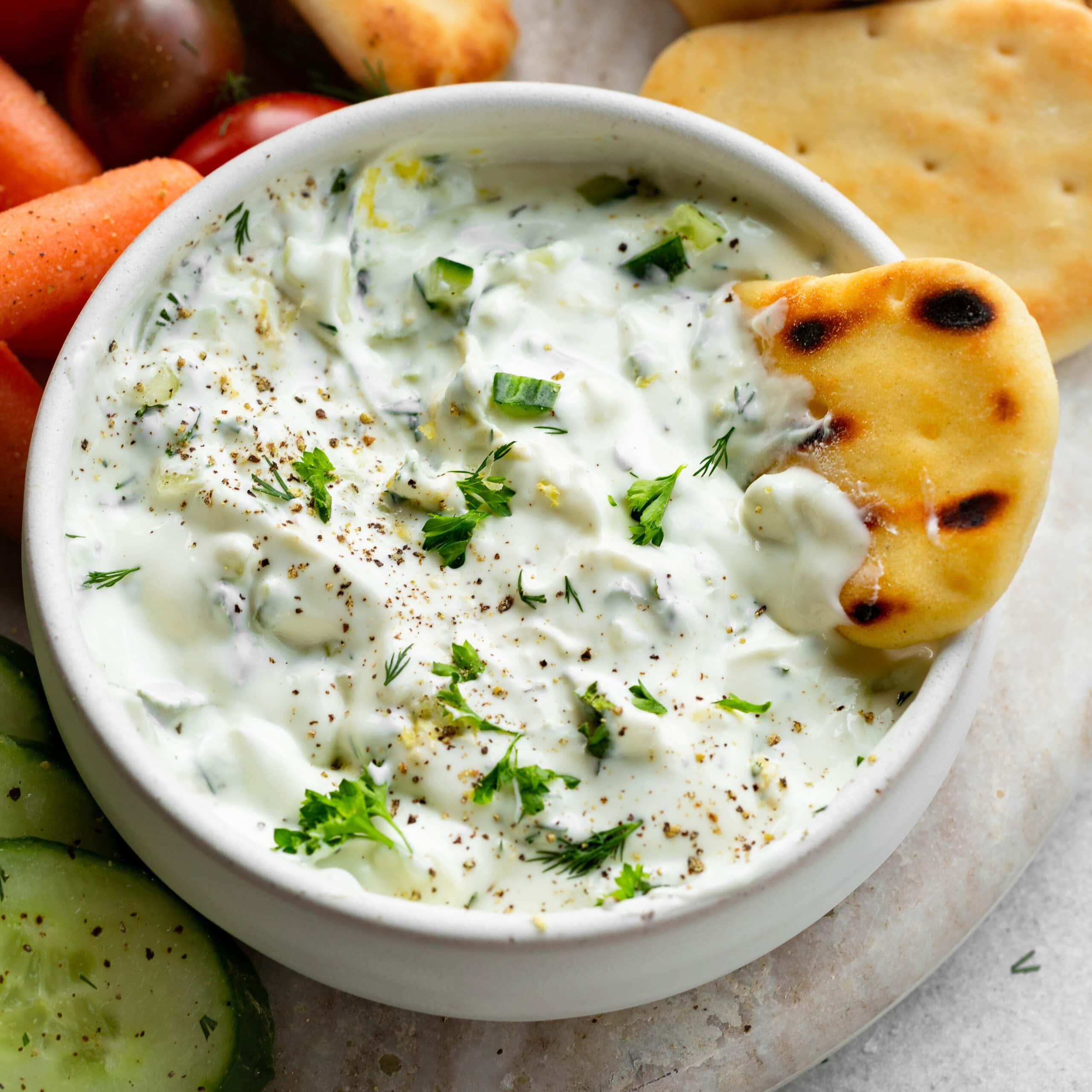 bowl of creamy sweet basil tzatziki