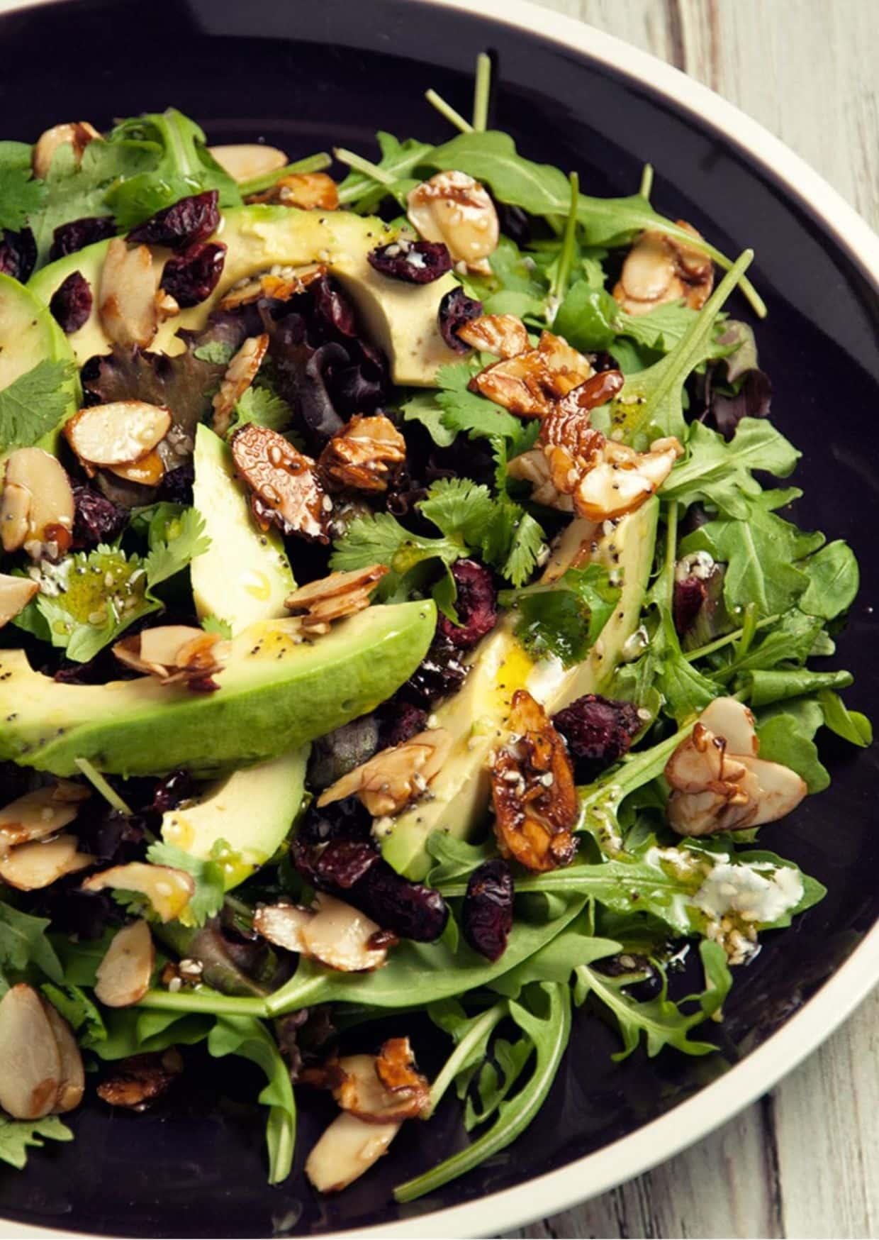 close up shot of avocado and cranberry salad