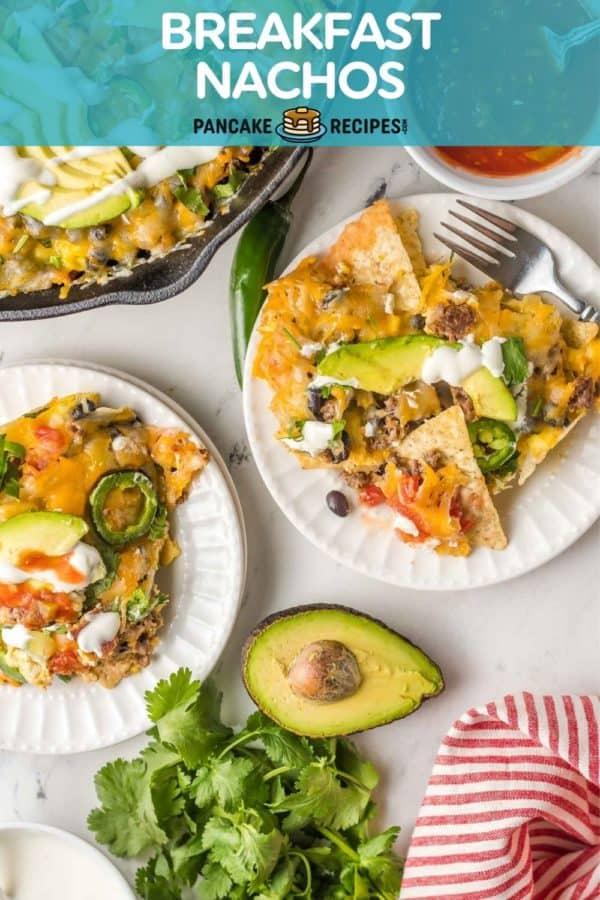 A person enjoying a plate of breakfast nachos