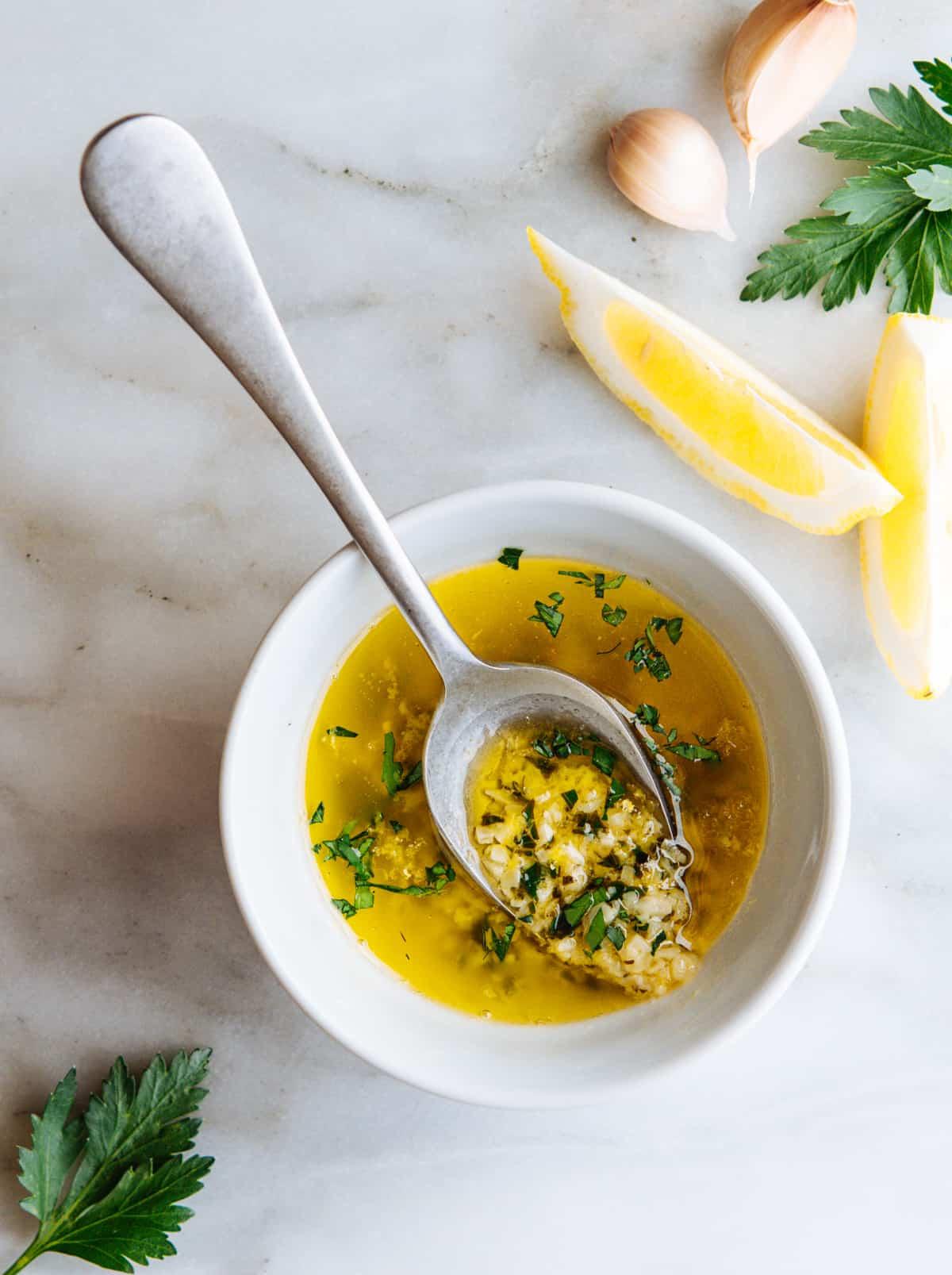Close-up shot of the lemon garlic sauce, highlighting its vibrant color and texture