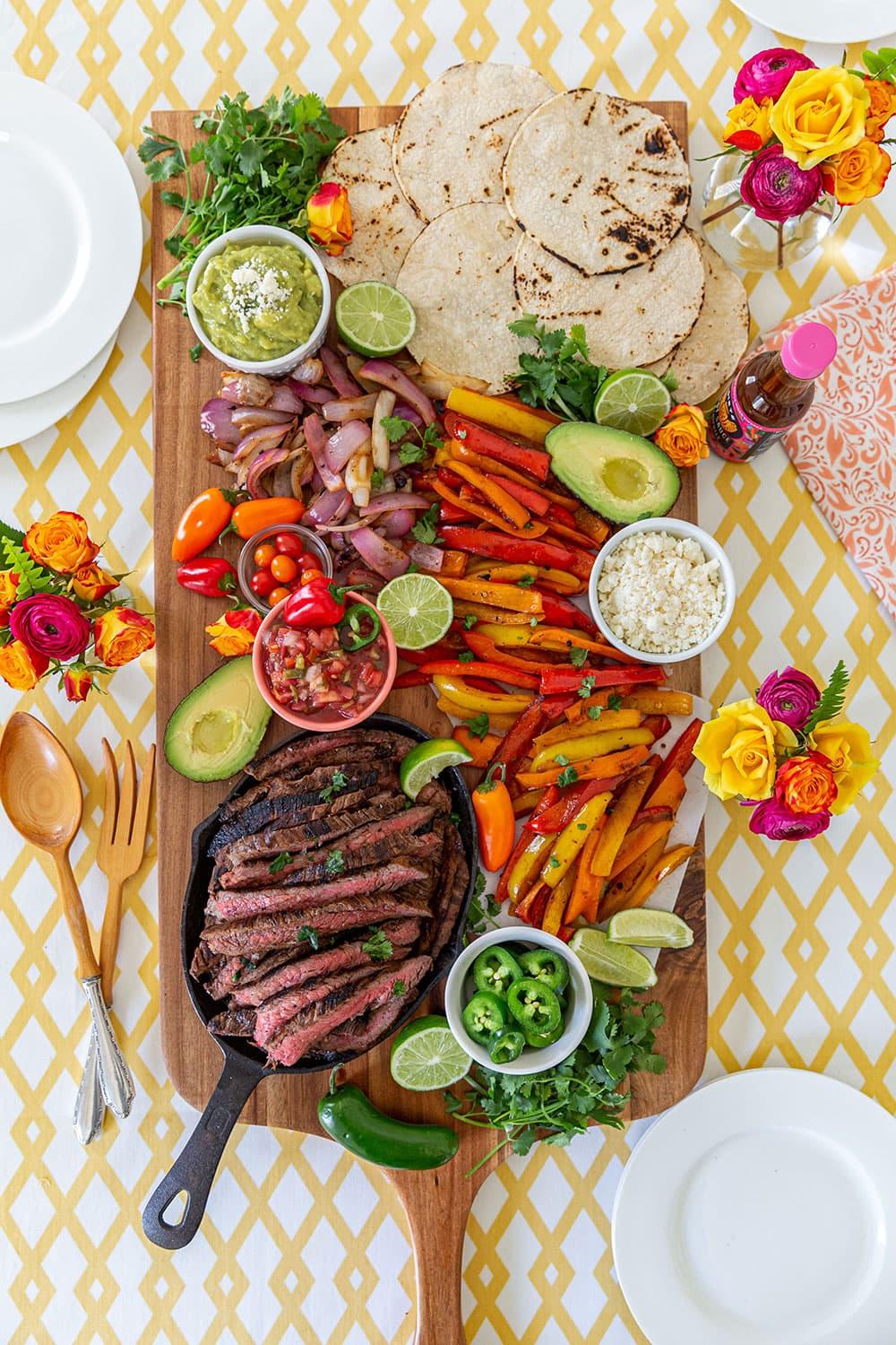 A table set with vibrant Plantain and Steak Fajitas
