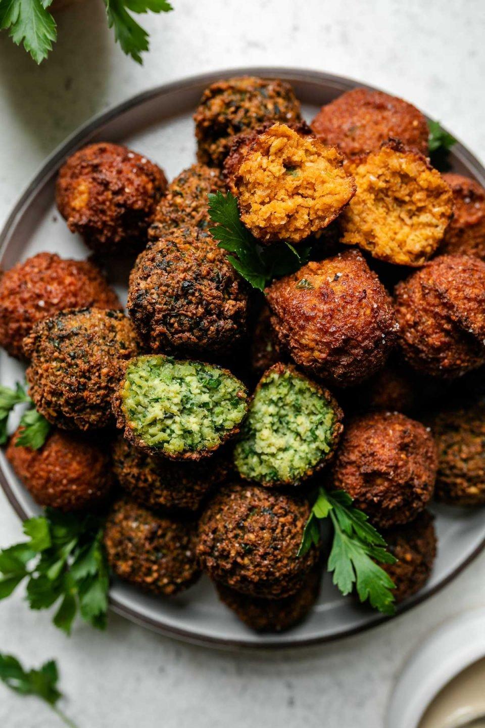 Close-up shot of crispy falafel with fresh parsley garnish