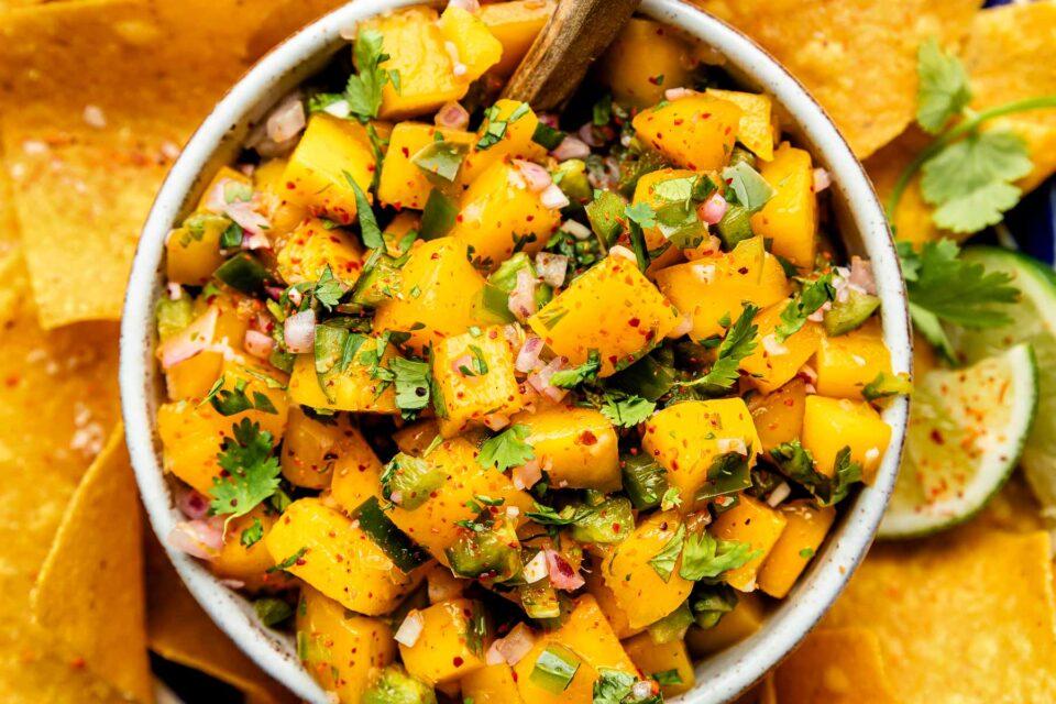 close-up shot of fresh mango salsa in a bowl