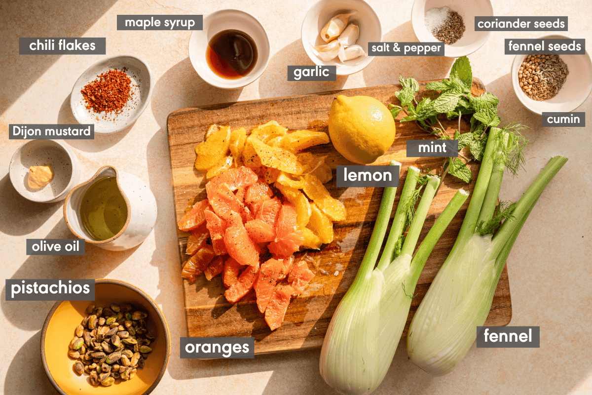 Overhead shot of all the ingredients for Fennel and Orange Fattoush laid out on a table