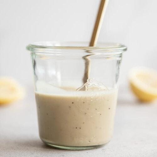 A bowl of vibrant lemon tahini dressing
