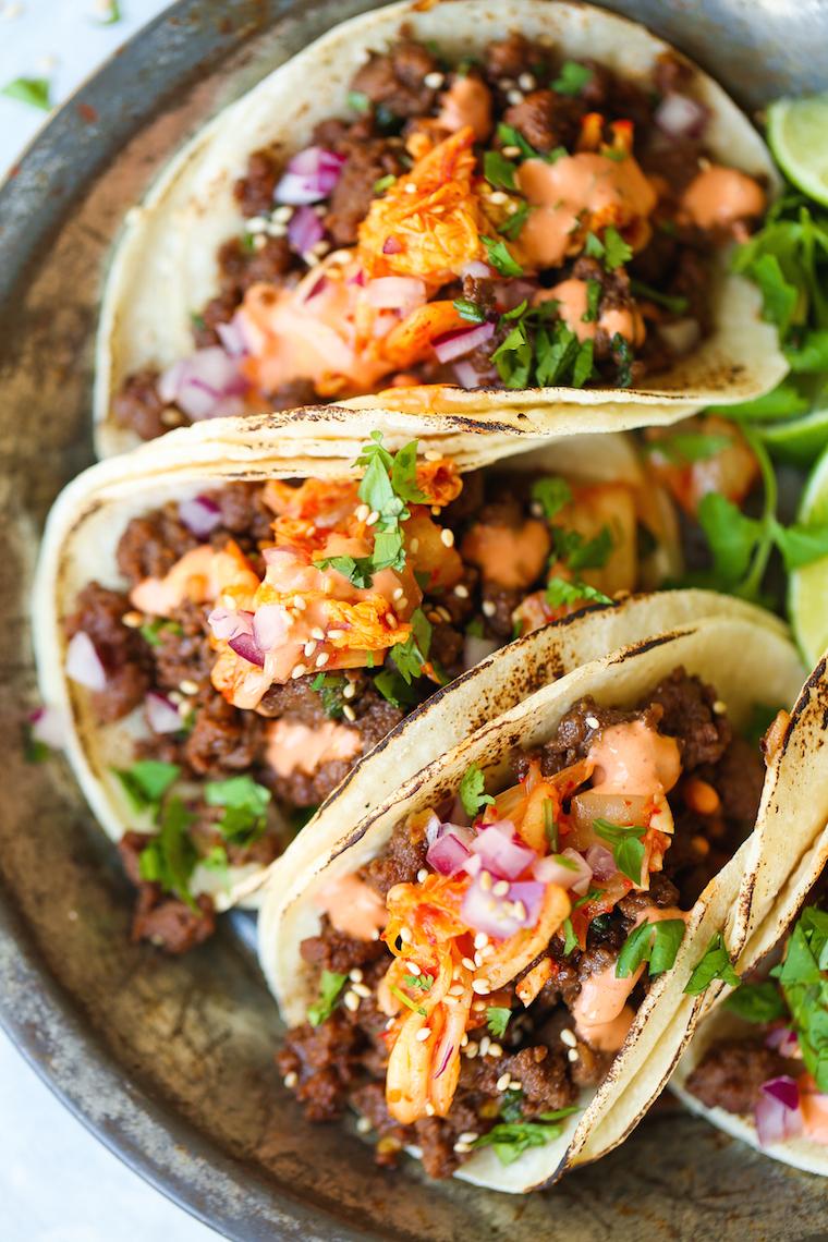 Korean BBQ beef tacos with kimchi and sesame seeds