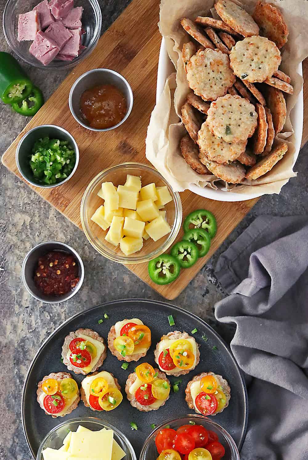 jalapeno keto crackers served with guacamole on a platter