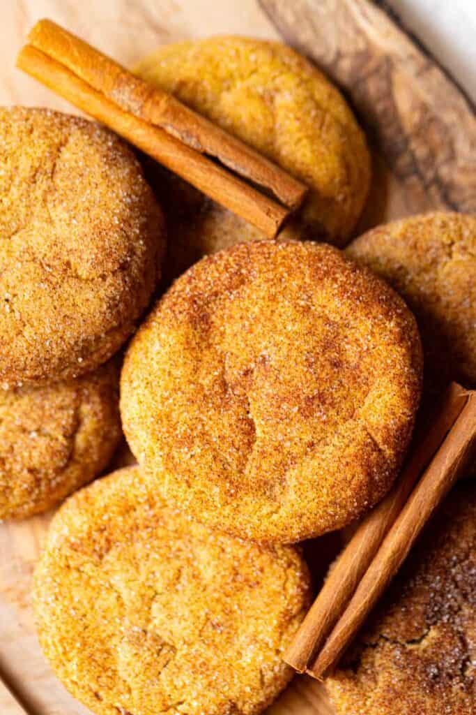 Close-up of a single pumpkin spice cookie with cinnamon, showing its texture