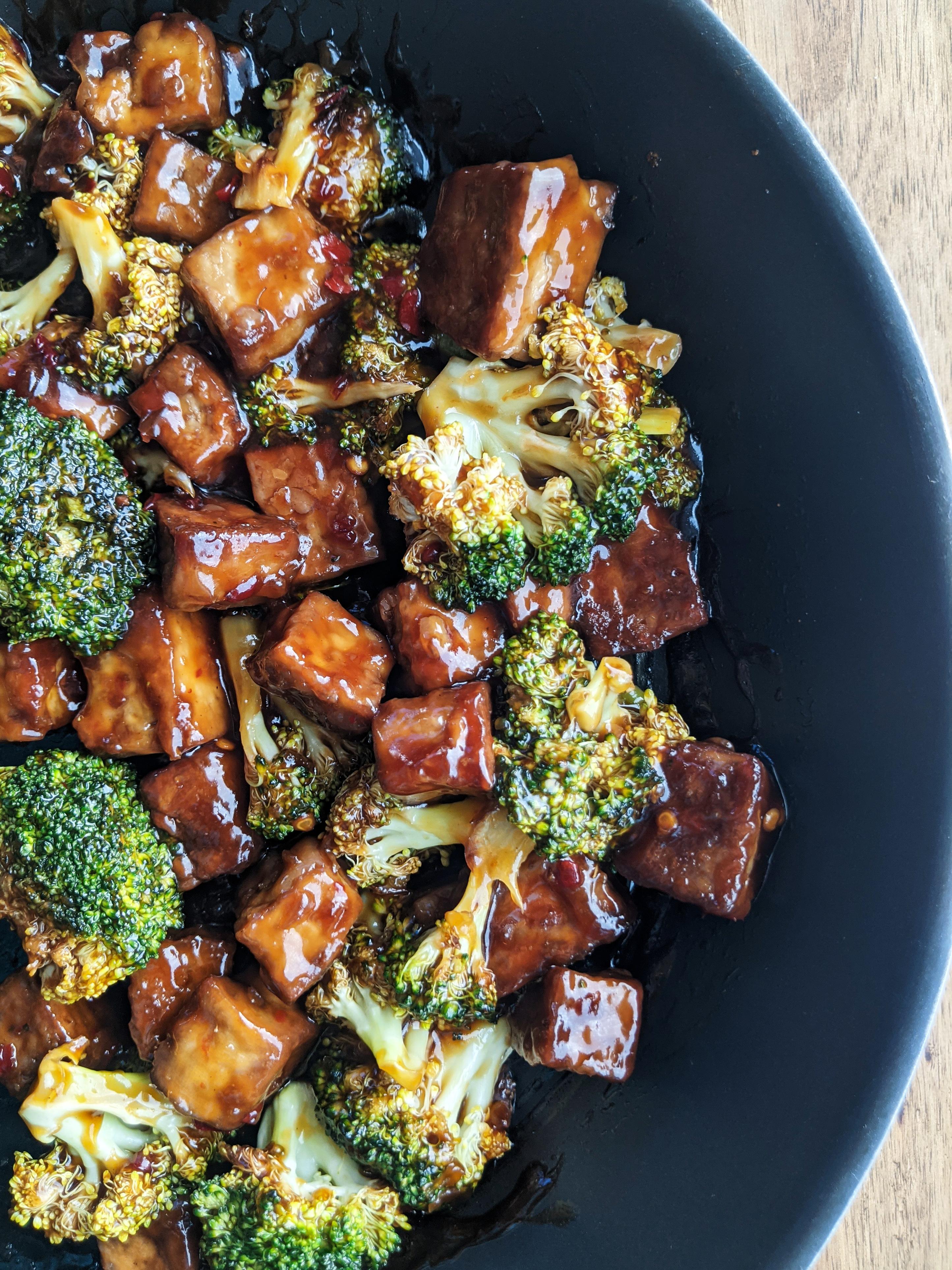 Close-up of the glossy General Tso's sauce coating the tofu and broccoli.