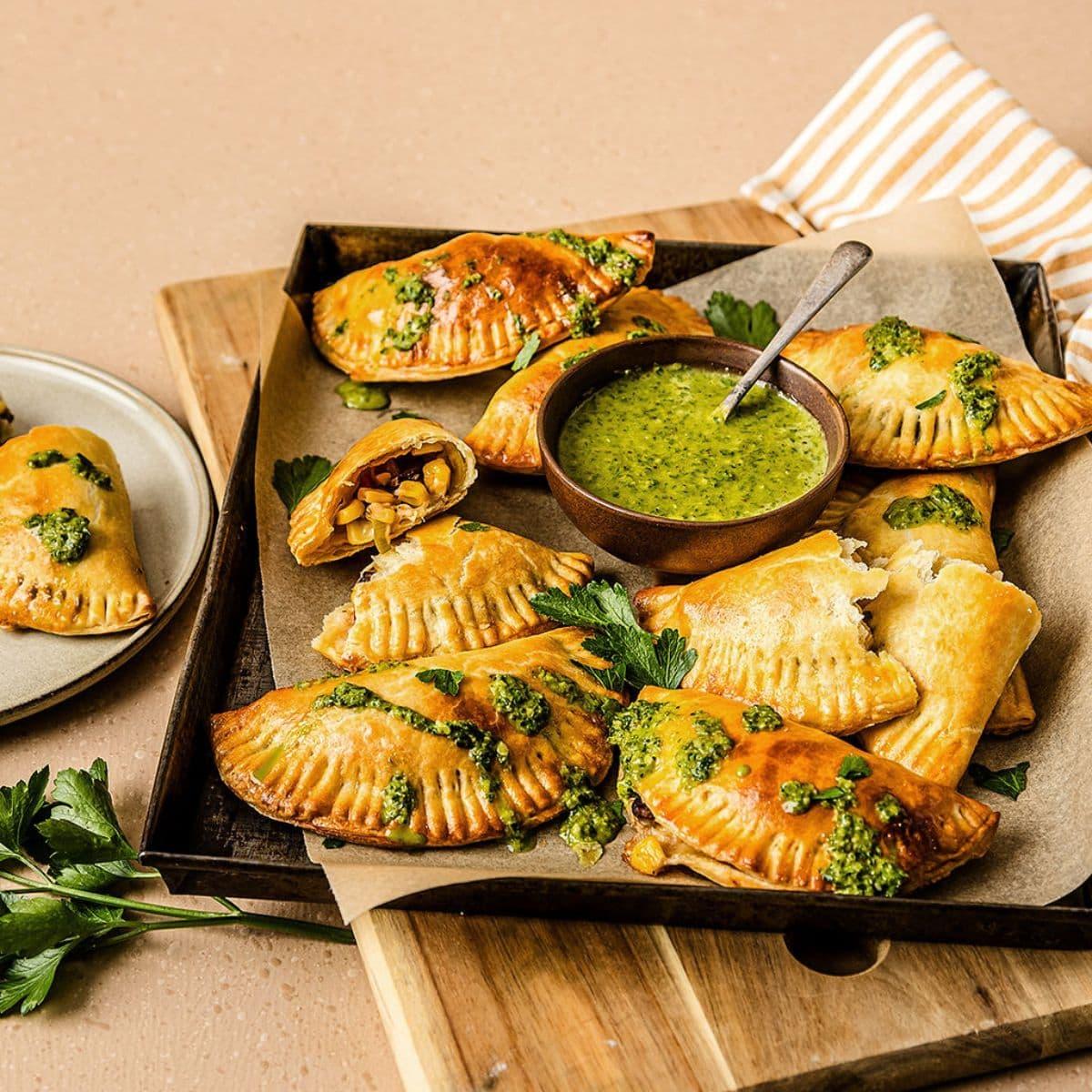 A platter of roasted vegetable empanadas, ready to be served