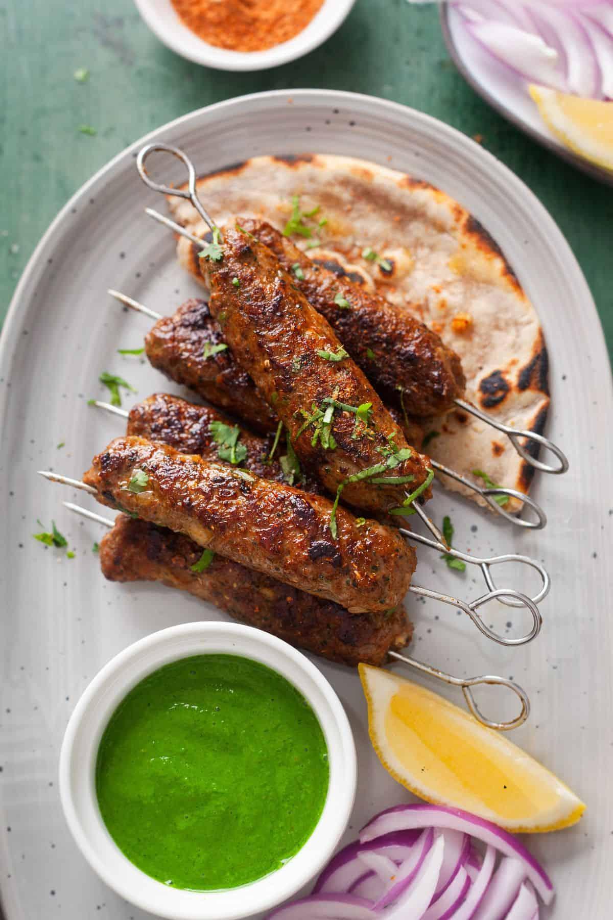Close-up shot of the ingredients for the lamb seekh kebabs and mint-cilantro chutney