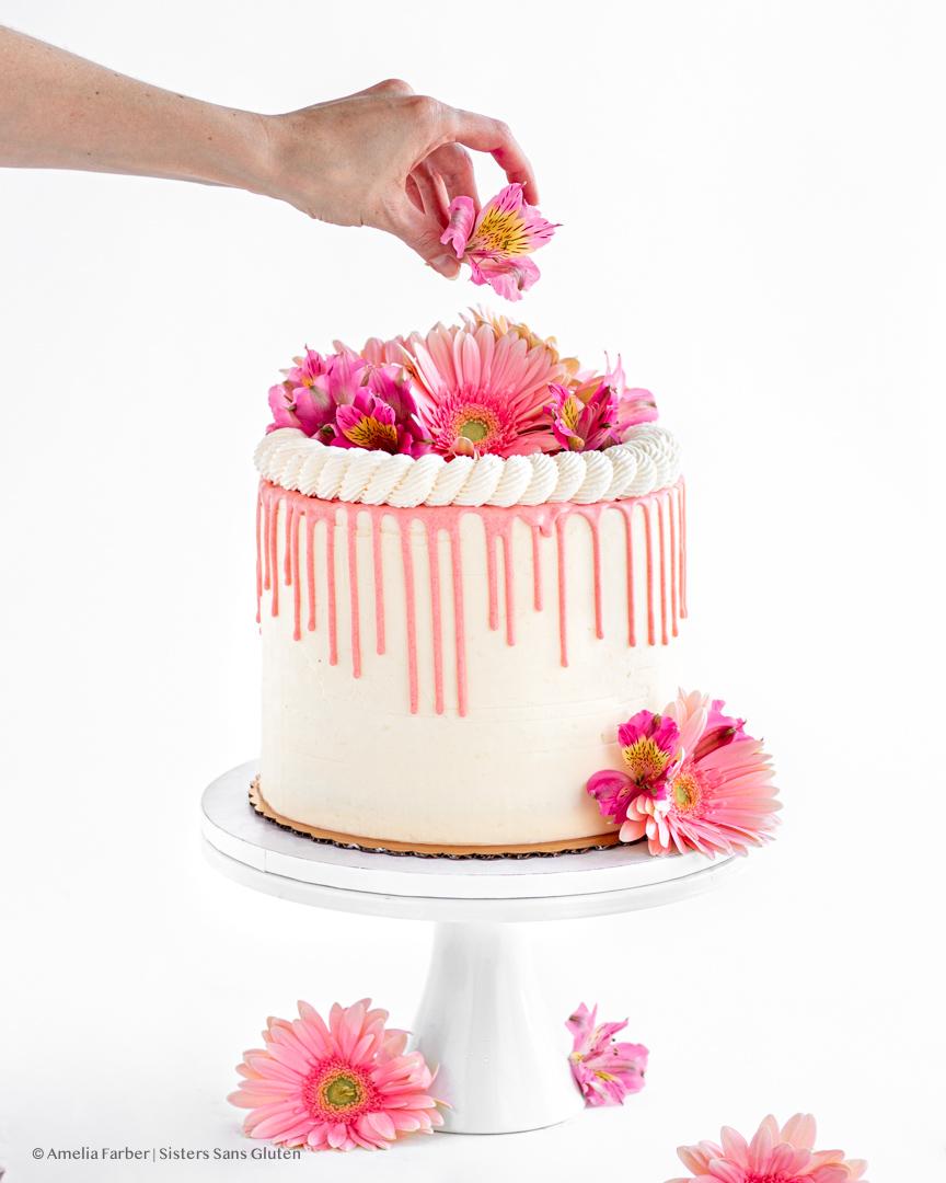 Guava cream cheese birthday cake with pink frosting and guava slices