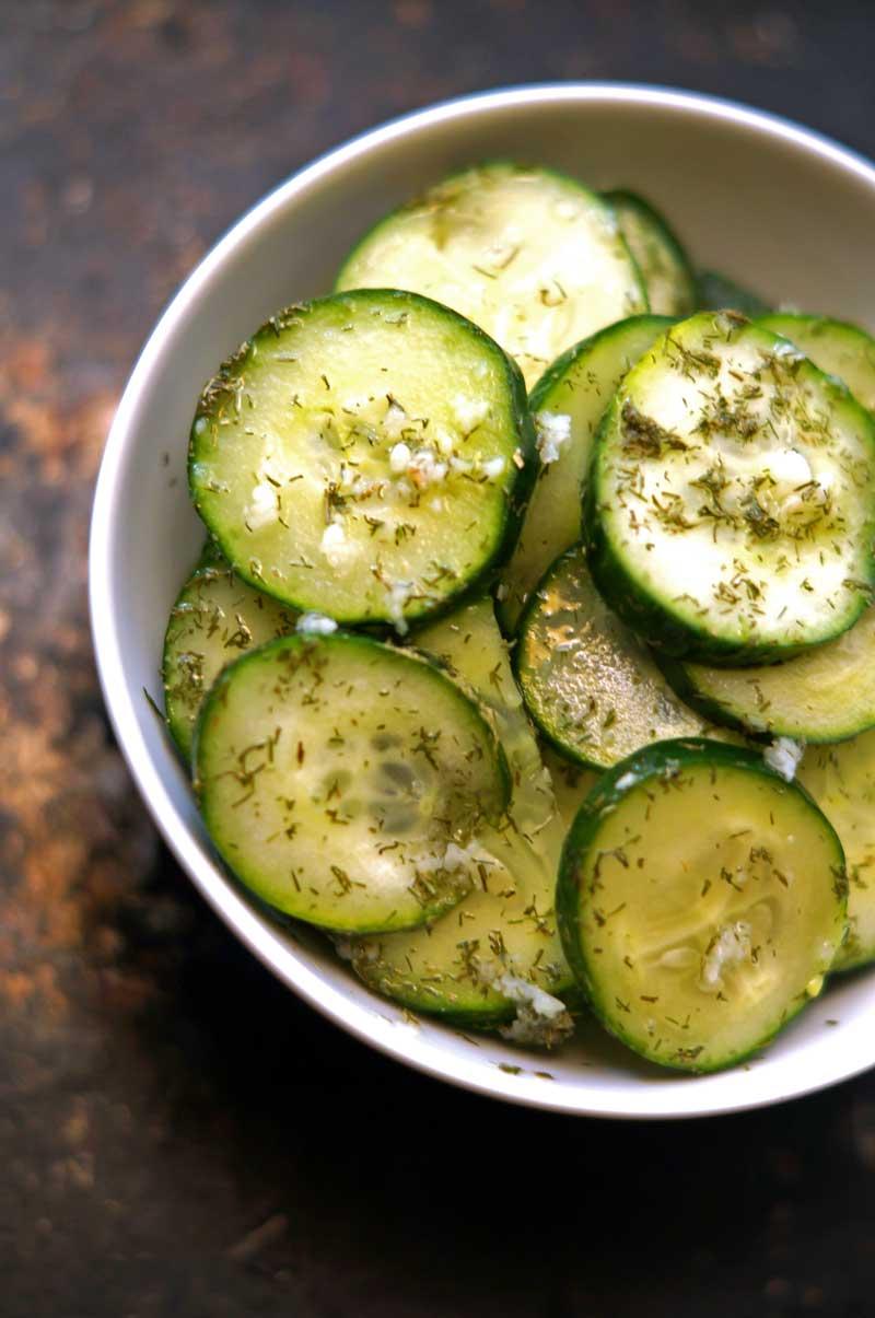 Close up of a pile of crispy dill pickle cucumber peel chips