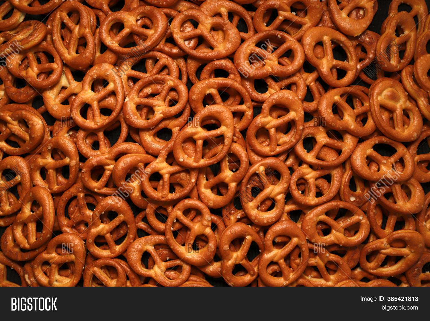 Close-up of a pile of pretzels, some showing the interior texture.