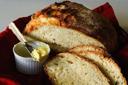 Close-up shot of a freshly baked Smoked Asiago and Walnut Bread loaf