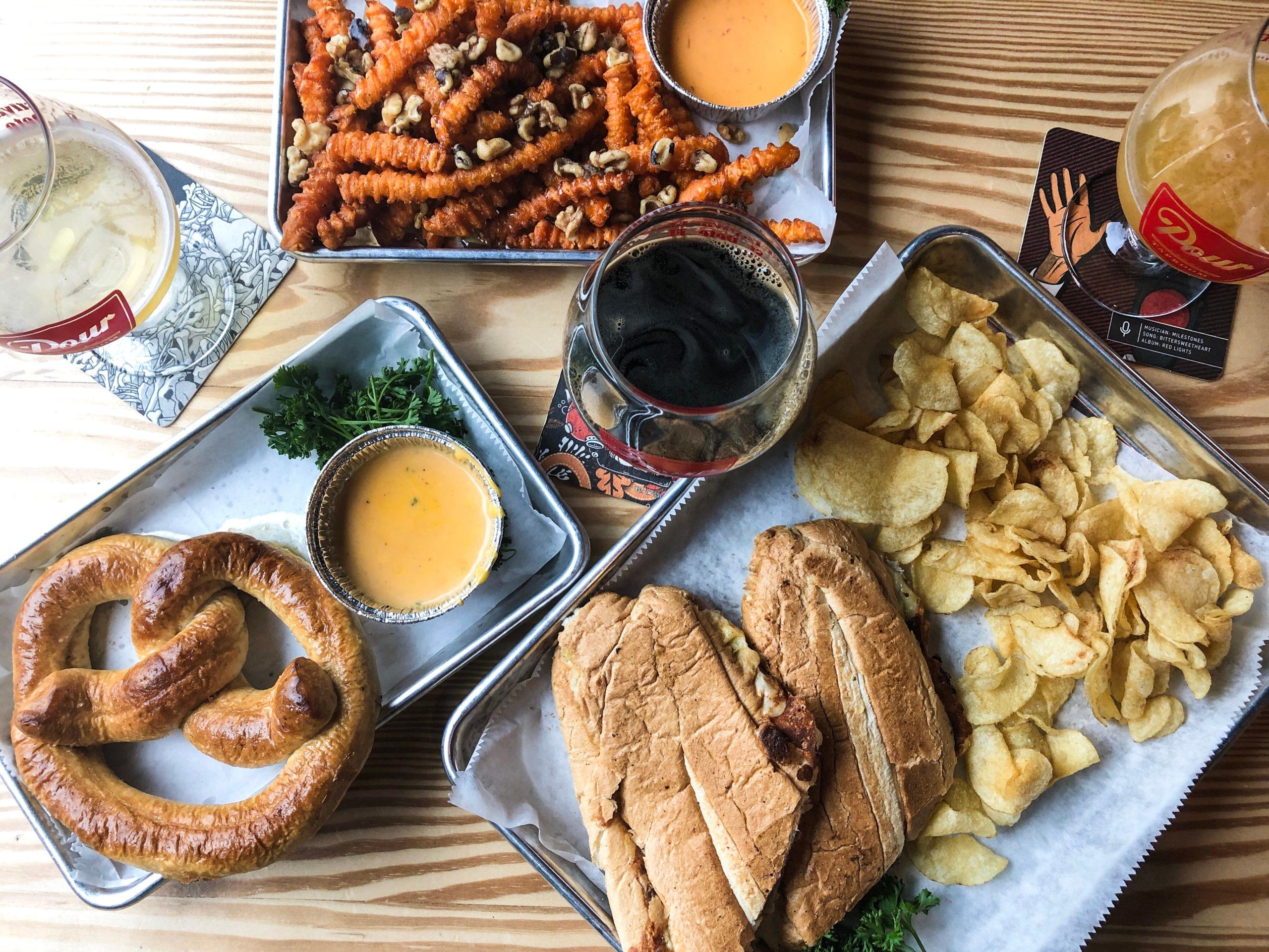 overhead shot of a bartender preparing a Beer-Pretzel Old Fashioned