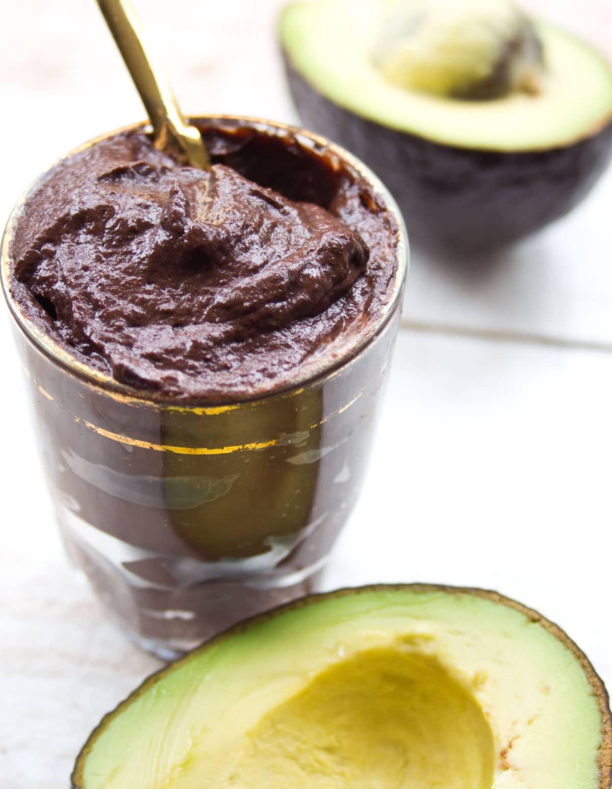 Close up shot of a spoonful of dark chocolate avocado mousse