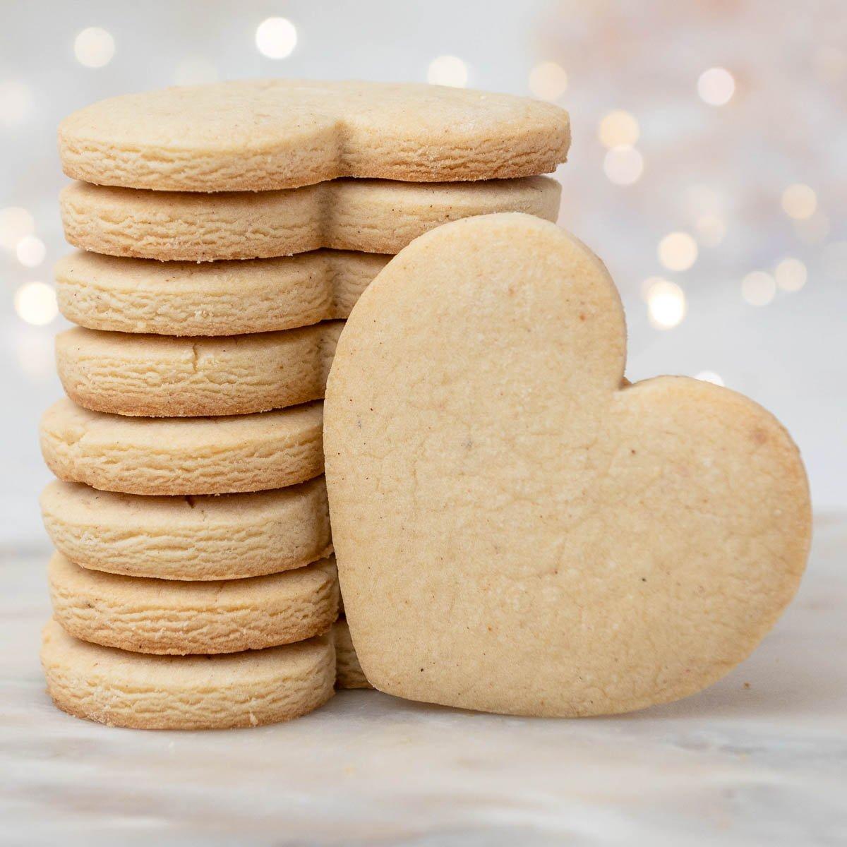 close-up of a perfectly baked sugar cookie, showing crisp edge and soft interior