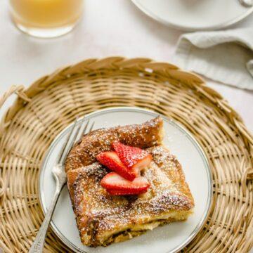 overhead shot of lemon ricotta french toast with berries and syrup