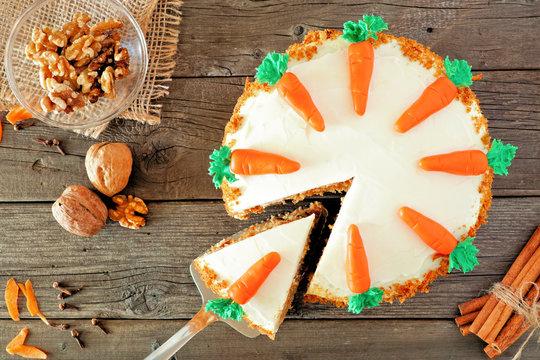 A rustic scene of a carrot cake, with a blurred backdrop of a field