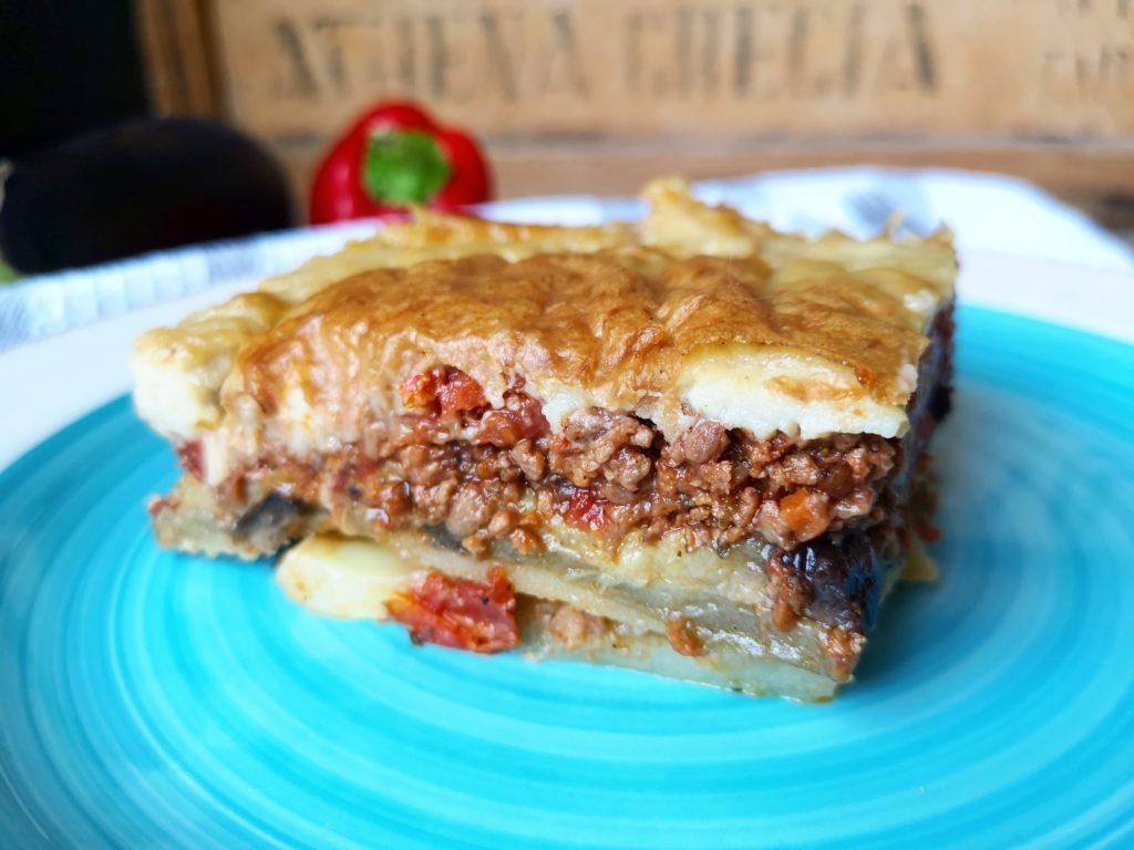Close-up of a slice of moussaka with visible layers